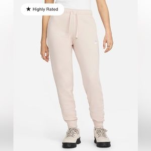 Nike Sportswear Club Fleece: Women's Mid-Rise Slim Joggers